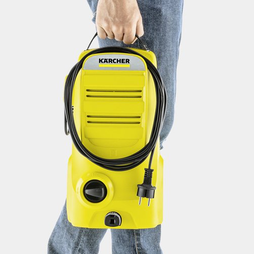 Мойка высокого давления Karcher К 2 Compact - <h3>Хранение шланга под передней крышкой</h3>
Шланг можно легко подвесить на передней крышке аппарата.